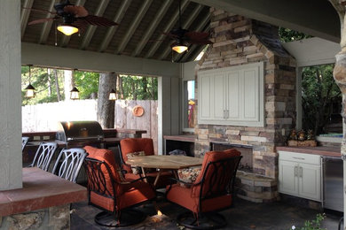 Example of an eclectic patio design in Little Rock
