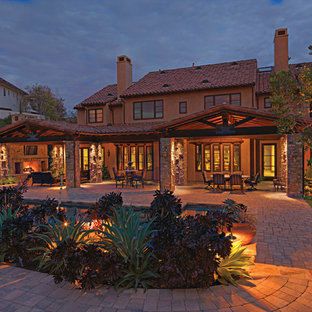 Example of a tuscan patio design in Orange County