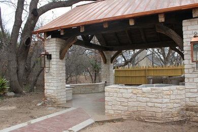 Inspiration for a medium sized traditional back patio in Austin with a gazebo.