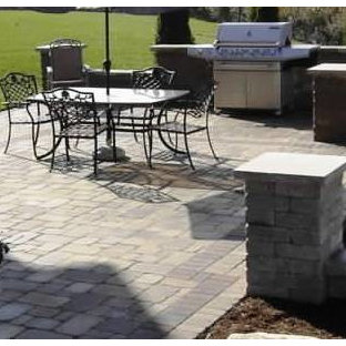 Patio kitchen - small traditional backyard brick patio kitchen idea in Indianapolis