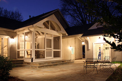 Inspiration for a large craftsman backyard stone patio remodel in Nashville with no cover