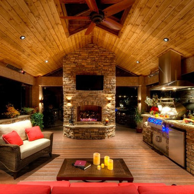 Large mountain style backyard patio kitchen photo in Denver with decking and a gazebo
