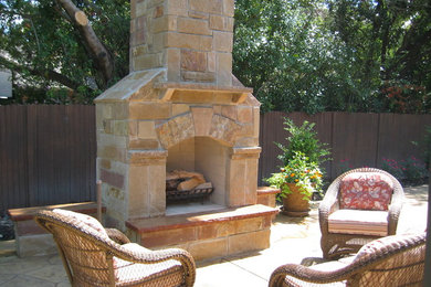 Patio - large traditional backyard stamped concrete patio idea in Dallas with a fire pit