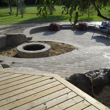 Outdoor living space with walkout basement addition
