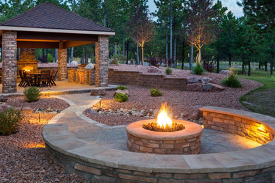 Example of an arts and crafts patio design in Houston