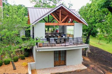 Modelo de patio tradicional con cocina exterior