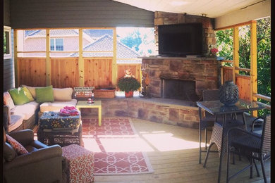 Inspiration for a mid-sized rustic backyard patio remodel in Other with a fire pit, decking and a roof extension