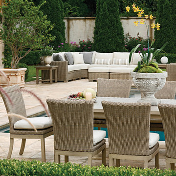 outdoor sectional sofa and patio dining set in resin wicker