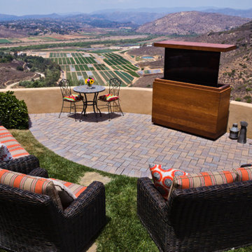 Outdoor TV lift island cabinet hides TV and keeps it safe