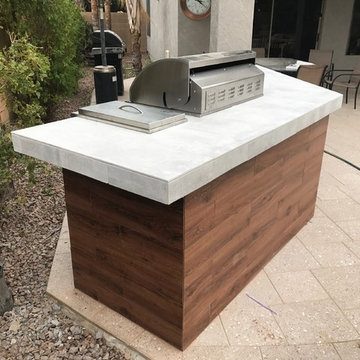 Patio and Modern BBQ Island with stainless grill and side burner