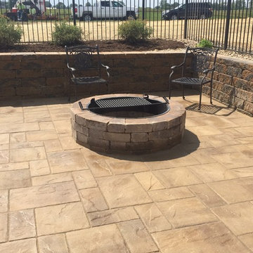 Patio around pool along with Walkway, retaining wall, fire pit and more