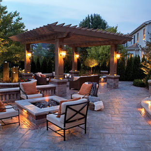 Patio by Unilock with Rivenstone and Copthorne paver and firepit