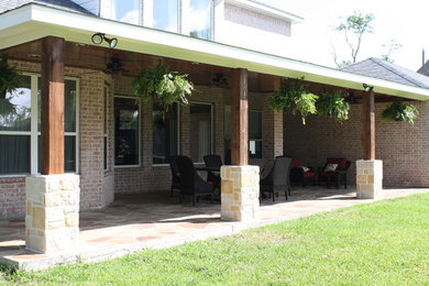 Patio - rustic patio idea in Houston