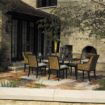 Patio dining set in wrought aluminum and our water hyacinth resin wicker