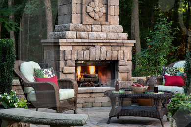 Example of a tuscan patio design in Charlotte