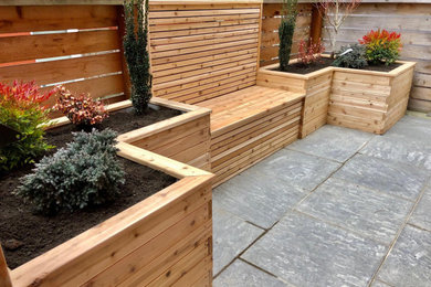 Example of a mountain style patio design in Seattle