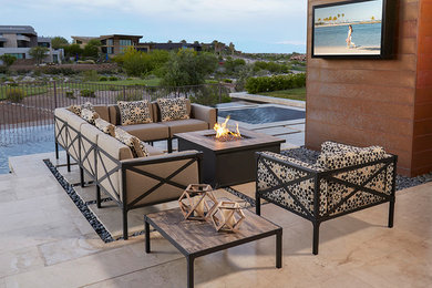 Patio - contemporary backyard tile patio idea in Los Angeles with a fire pit