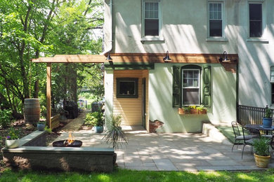 Inspiration for a small rustic backyard patio remodel in Philadelphia