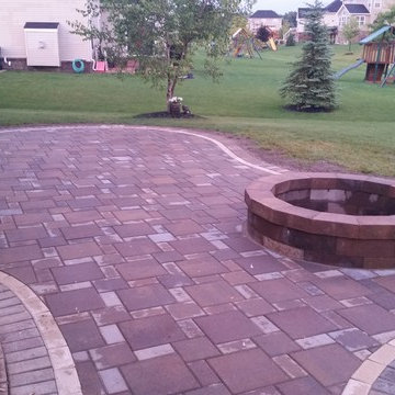 Patio with fire pit and seat wall