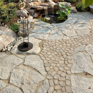 patio with fountain and pondless waterfall