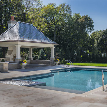 Patio with swimming pool, built in sunshelf and spa