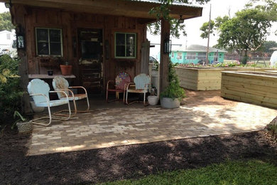 Patio - farmhouse patio idea in Houston