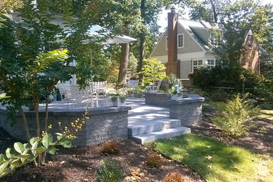 Mid-sized elegant backyard concrete paver patio photo in Baltimore