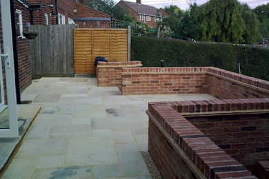 Design ideas for a contemporary patio in Hertfordshire.