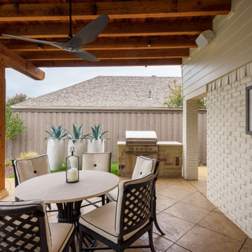 Patterned Concrete Patio with Driftwood fence