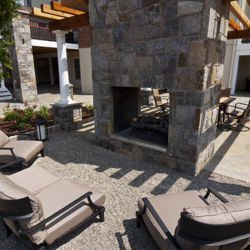 Pea gravel patio and outdoor fireplace