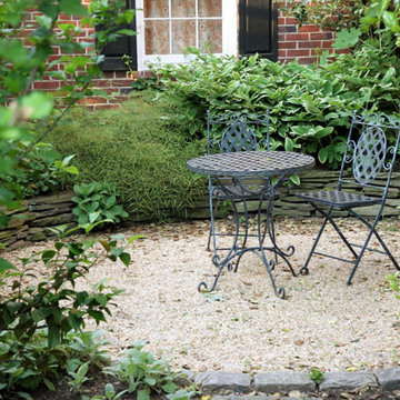 Pea Gravel Patio with Stacked Stone Wall