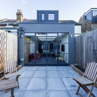 Inspiration for a small contemporary back patio in Other with no cover.