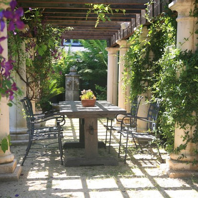 Example of a tuscan patio design in San Francisco with a pergola