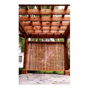 Esempio di un patio o portico stile americano