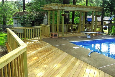 Design ideas for a back patio in Other with a water feature and a pergola.