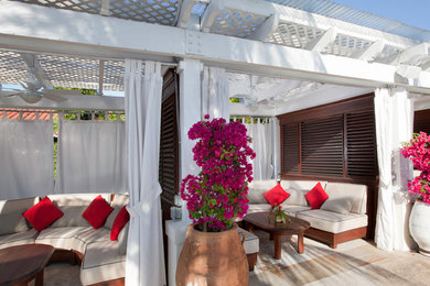 Patio - traditional patio idea in Miami with a pergola