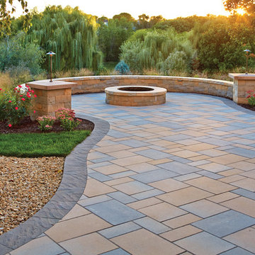 Picturesque Patio: Paver patio, fire pit and curved seat wall