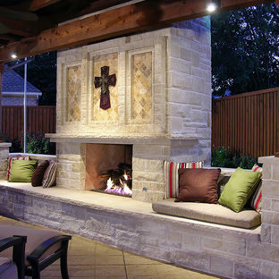 Patio kitchen - large traditional backyard concrete paver patio kitchen idea in Dallas with a pergola