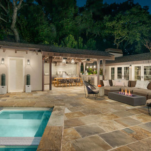 Immagine di un patio o portico contemporaneo di medie dimensioni e nel cortile laterale con pavimentazioni in pietra naturale e un gazebo o capanno