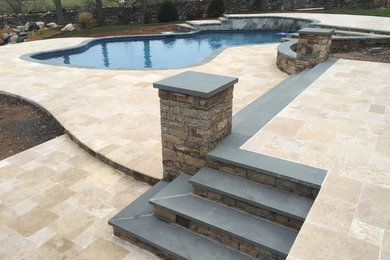 Inspiration for a modern stone patio remodel in DC Metro