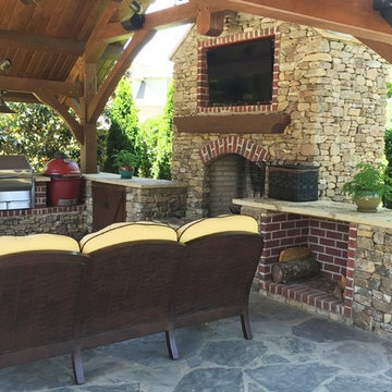 Poolside Outdoor Kitchen and Fireplace in Alabama