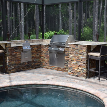 Poolside outdoor kitchen with Solaire gill and single side burner.