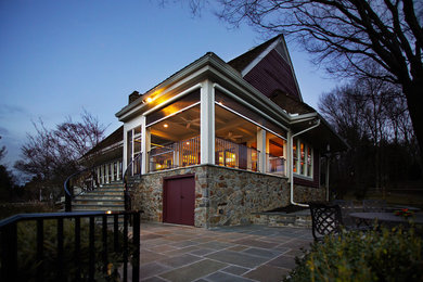 Porch Addition with Natural Stone and Retractable Screens