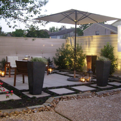Inspiration for a contemporary patio remodel in Houston with no cover