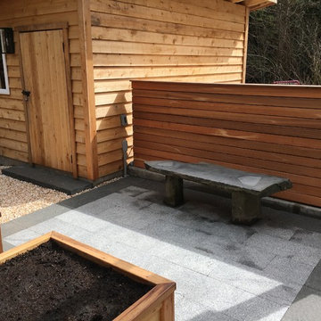 Potting shed patio & stone bench