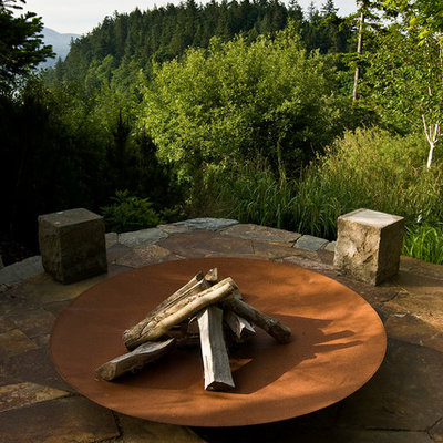 Inspiration for a timeless patio remodel in Seattle with a fire pit