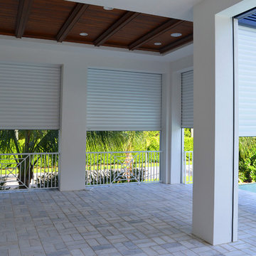Private Residence - Built-in Titan Screen stacked with Nautilus Shutters
