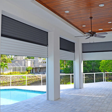 Private Residence - Built-in Titan Screen stacked with Nautilus Shutters