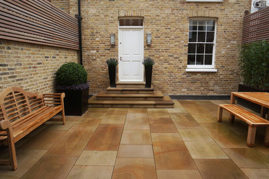Inspiration for a large classic patio in London.