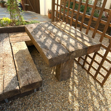 railway sleeper dining area and trellis for privacy